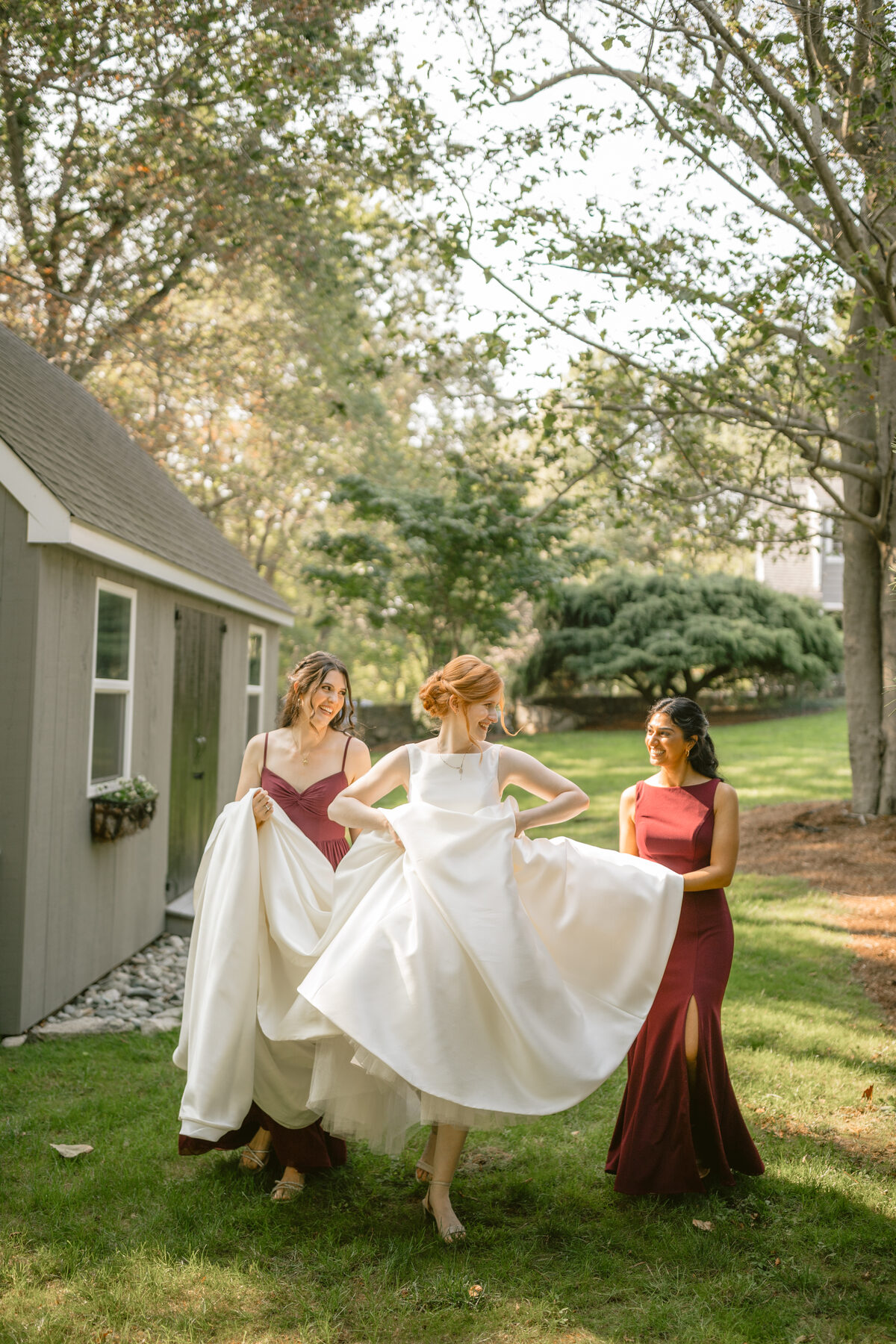 Bride and bridesmaids on the lawn before the wedding